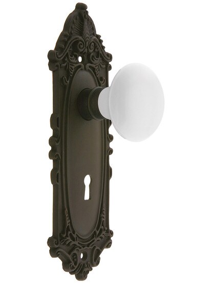 Largo Design Mortise Lock Set With White Porcelain Door Knobs in Oil Rubbed Bronze.